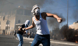 Palestinains with rocks