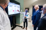 fauci biden explaining mrna double masked