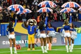 london-uk-27-october-2019-rams-mascot-and-cheerleaders-and-union-jack-umbrellas-ahead-of-the-nfl-match-cincinnati-bengals-v-los-angeles-rams-at-wembley-stadium-game-3-of-this-years-nfl-london-games-