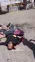 gazan family shot in the street_thumb.jpg
