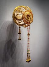 Unknown artist (Ptolemaic 3rd-2nd c. BC) Aphrodite with Eros - gold, garnets and glass paste c.225-175 BC a [medallion in a hairnet, probably from Alexandria]