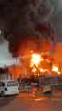 Russian Telegram channels report a drone attack and fire at Rosneft oil depot in Adler area, Krasnodar region of Russia, 03-08-2025 Sochi V1 HD_thumb.jpg
