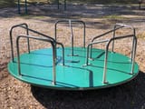 2024-10-10_14_31_55_A_merry-go-round_at_the_playground_within_Ann_M._Banchoff_Park_in_the_Mountainview_section_of_Ewing_Township,_Mercer_County,_New_Jersey