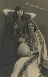 An old photo of Palestinian women from Jaffa wearing hand-embroidered Palestinian folklore clothing in 1910.