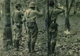 japanese soldiers saluting british grave ww2