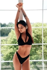 google search a woman in a bikini with big boobs