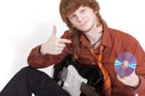 musician-guitar-selling-compact-disc-11611022