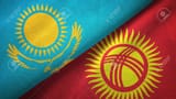 121207207-kazakhstan-and-kyrgyzstan-flags-together-textile-cloth-fabric-texture