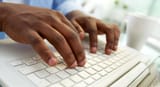 brown hands typing post