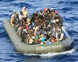 immigrants on raft