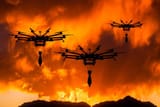 military-drone-with-a-bomb-at-sunset-attack-drone-in-military-conflicts