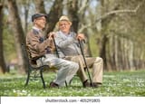 two-old-friends-sitting-on-260nw-405291805