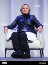 sporting-a-boot-on-her-right-foot-due-to-a-broken-toe-hillary-clinton-sits-on-stage-during-a-book-tour-event-in-vancouver-bc-on-wednesday-december-13-2017-the-canadian-pressdarryl-dyck-2HRDTJW