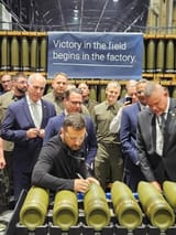 president-volodymyr-zelenskyy-signs-an-artillery-shell-v0-km6qa5kQPoTZ0D1emGlKYsXCoUycVVjL6GLVINMYgu8