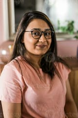 head-shot-portrait-smart-confident-smiling-millennial-indian-woman-attractive-young-hindu-teenager-student-girl-freelancer-looking-at-camera-posing-for-photo