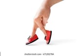 woman-hand-finger-walking-shoe-260nw-671202784