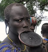 Mursi_Lip_Plate,_Ethiopia_(11886606444)