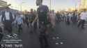 Border Police female fighter was recorded stepping on the head of a Haredi protester in Bnei Brak_thumb.jpg