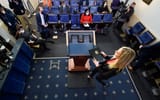 Kayleigh-McEnany-Standing-High-Angle-POV-Rear-View-Podium-Blonde-American-Politician-Republican-1230471977
