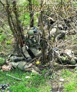 zigger hides amongst dead comrades
