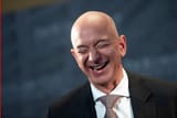 jeff-bezos-founder-and-ceo-of-amazon-laughs-as-he-speaks-during-the-economic-club-of