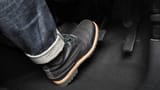 accelerator-and-breaking-pedal-in-a-car-close-up-the-foot-pressing-foot-pedal-of-a-car-to