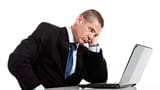 bored-tired-and-frustrated-businessman-gets-grumpy-with-laptop[1]