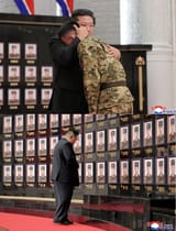 1374 Kim Jong Un embraces an upset soldier at a memorial to dead NKA troops from the Kursk operation 21-8-25