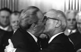 leonid-brezhnev-and-erich-honecker-embrace-with-the-v0-vqrcqhff5aod1