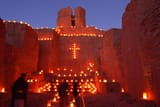 1200px-Farolitos,_old_church,_Jemez_State_Monument