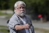 2023-armed-man-shot-protesters-858106877