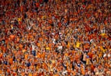 oranjezee-op-de-tribune-in-berlijn-tijdens-het-kwartfinaleduel