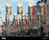 rainbow-flags-hanging-over-regent-street-during-the-pride-in-london-parade-in-2022-2JFJED5-4127458123