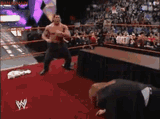 batista-bomb-triple-h-through-a-table