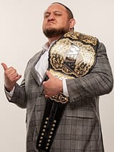 Samoa_Joe_with_AEW_World_title_DYNAMITE_2024_01_10_035_(cropped)