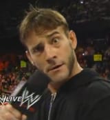 15905 - Raw cm_punk head_tilt microphone raised_eyebrow wwe