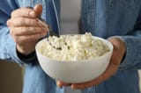 hands-holding-cottage-cheese