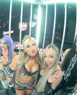 TiffyAndLivThrowingPeaceSignsAtWargamesCageCamera