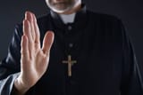 priest hand wave stock img