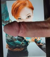 Using her mouth