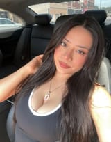 Janet in her car
