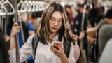 Teeage-girl-texting-subway
