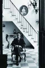 Yukio Mishima calm sitting on a chair