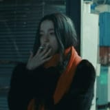 sad young woman smoking