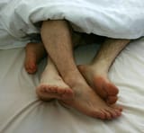 Gay_Couple_togetherness_in_bed_01