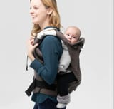 woman-carrying-baby-carrier-on-back-467084