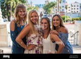 pretty-college-girls-together-in-a-group-posed-over-the-downtown-ventura-K0WD4K