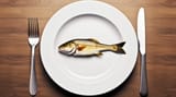 plate-with-fish-it-plate-with-fork-knife-it_777078-7072