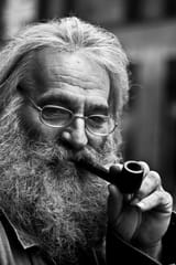 wise-old-man-with-pipe