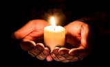 handsholidingcandle.0x350